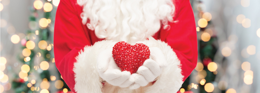 Santa Claus holding a heart